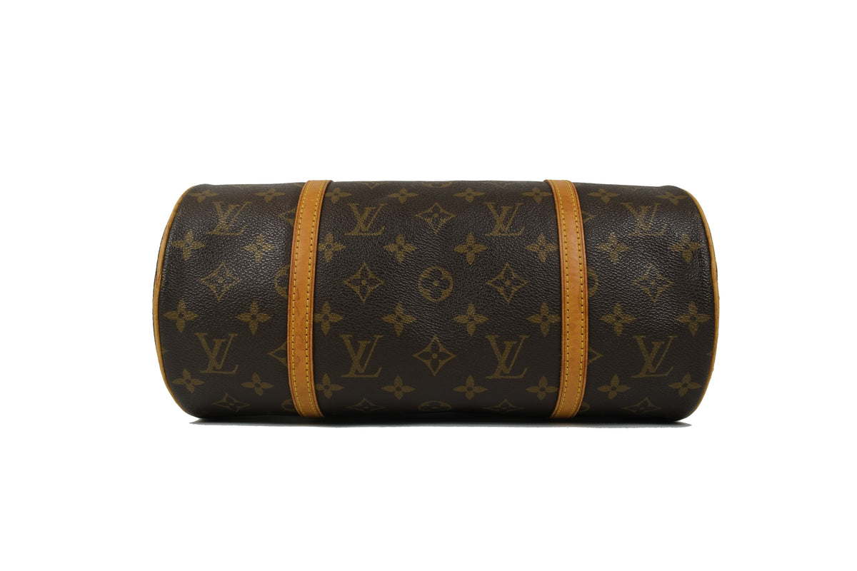Close-up of the tan leather strap and Monogram canvas on the Louis Vuitton Papillon 30