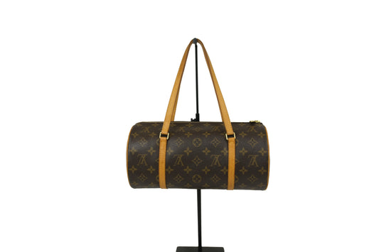 Close-up of the tan leather handles on the Louis Vuitton Papillon 30