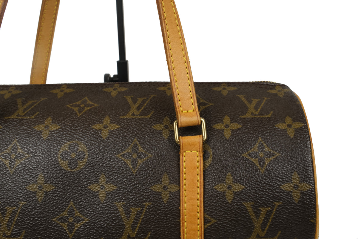 Louis Vuitton Monogram Papillon 30 cylindrical handbag with tan leather straps, front view