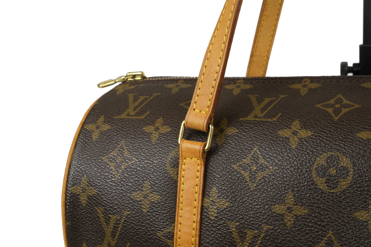 Louis Vuitton Monogram Papillon 30 handbag, front view with classic canvas pattern and tan handles