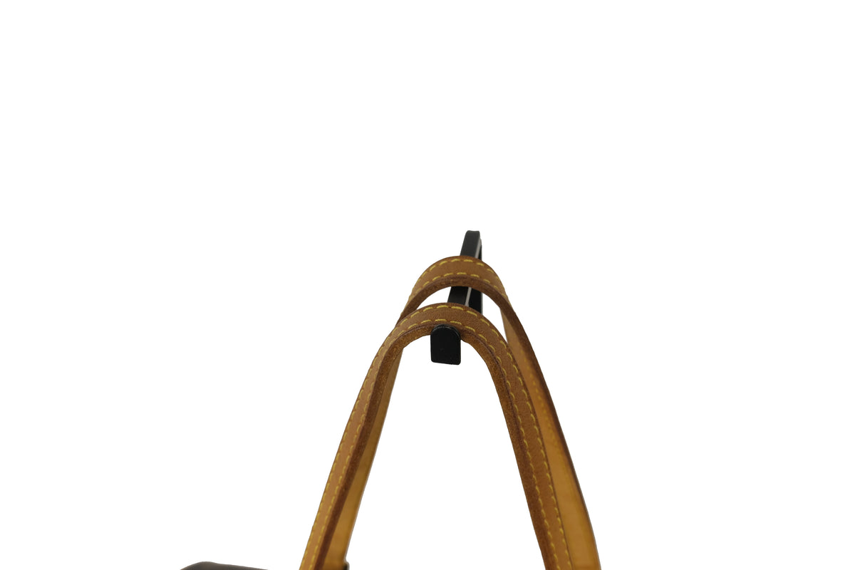 Base of the Louis Vuitton Monogram Papillon 30 cylindrical handbag