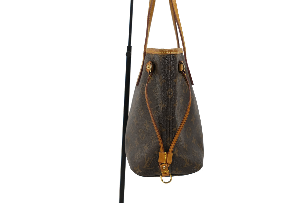 Front view of the brown Louis Vuitton Monogram Neverfull PM tote bag