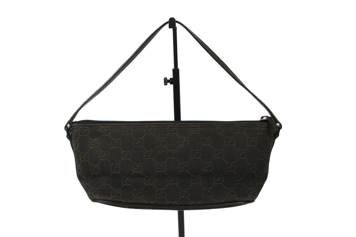 Base of the Gucci Boat Pochette showing the dark canvas pattern
